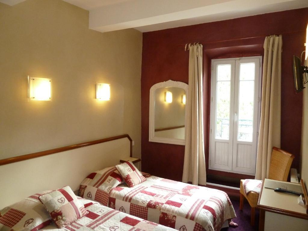 Logis Hotel Restaurant La Farigoule Sainte-Cécile-les-Vignes Rum bild